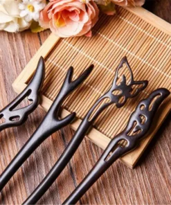 Hand Carved Ebony Clipss