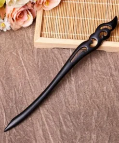 Hand Carved Ebony Clipss