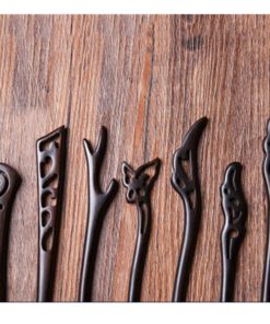 Hand Carved Ebony Clipss