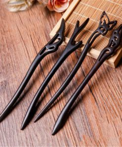 Hand Carved Ebony Clipss