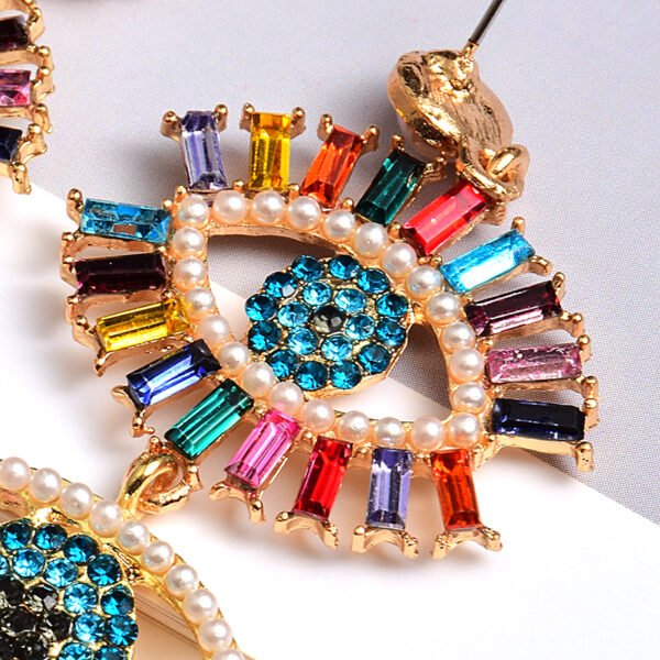 Devil’s Eye Long Pearl Earrings