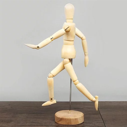 Drevená ľudská figurína na kreslenie na tele
