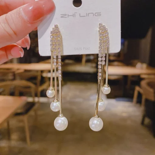 Fashion nga Diamond Ball Tassel Earrings