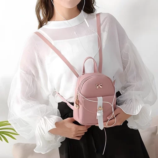 Prekrasan mini ružičasti kožni ruksak