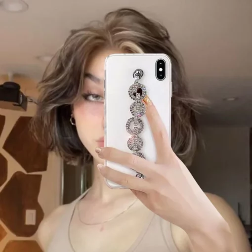 Capa de telefone com pulseira de diamante