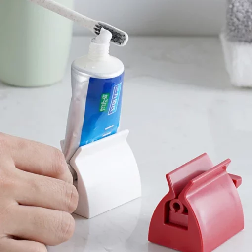 Espremedora de pasta de dents de tub rodant